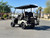 Evolution Summit Air Classic 2+2 Road electric golf cart with four-passenger seating, rear folding seat, extended roof, and road-ready features.