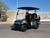 Evolution Summit Air Classic 2+2 Road electric golf cart with four-passenger seating, rear folding seat, extended roof, and road-ready features.