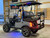 TEKO EV Turbo 4 passenger lithium electric golf cart with touchscreen display, LED underglow lighting and rear flip seat at East Central Sports Rush City Minnesota