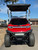 TEKO EV Turbo 4 passenger lithium electric golf cart with touchscreen display, LED underglow lighting and rear flip seat at East Central Sports Rush City Minnesota