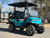 TEKO EV Turbo 4 passenger lithium electric golf cart with touchscreen display, LED underglow lighting and rear flip seat at East Central Sports Rush City Minnesota