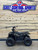 The image features the Denago E-Hawk 6 ATV, a sleek and modern electric ATV designed for kids aged 6 and up. The ATV showcases a bold black finish with multicolored LED lights, giving it a stylish and futuristic look. The rugged all-terrain tires (AT 16 x 8-7) and double A-arm front suspension highlight its capability to handle various terrains, from dirt trails to grassy fields. The handlebar-mounted controls, including the push-button gear selector and keyed ignition, are clearly visible, emphasizing the ATV's user-friendly design. The compact dimensions (51" x 31" x 32.5") and low seat height (23.5") make it perfectly sized for young riders, while the 48V removable lithium-ion battery and 1600W brushless electric motor underscore its eco-friendly and high-performance features. Safety elements like dual hydraulic disk brakes and an anti-theft alarm are subtly integrated into the design. This image captures the essence of the E-Hawk 6 ATV as a safe, fun, and technologically advanced electric vehicle for kids.