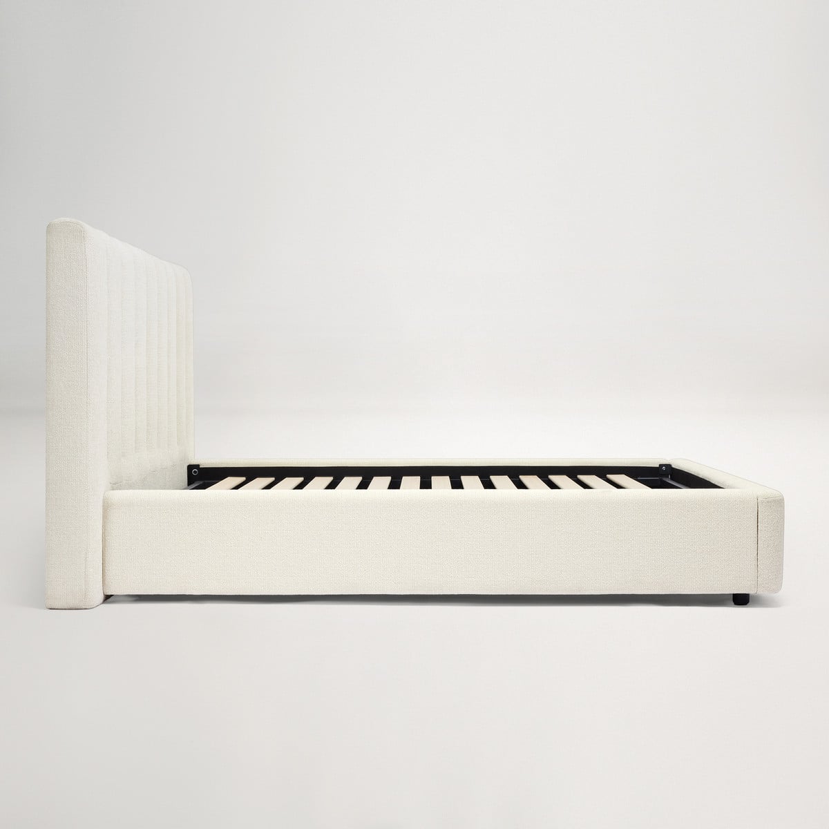 a white rectangular object with a black object on top