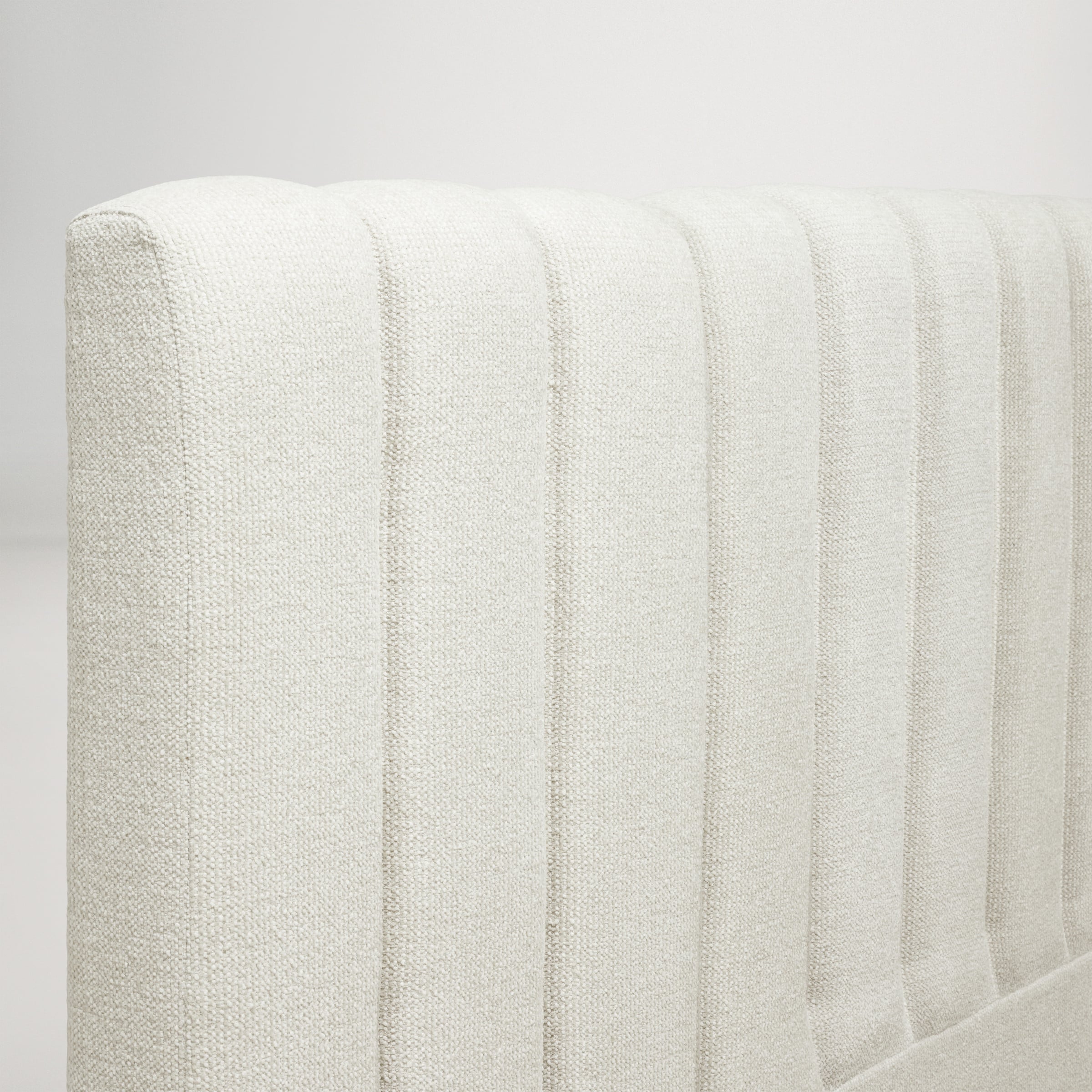 a white pillow on a white surface