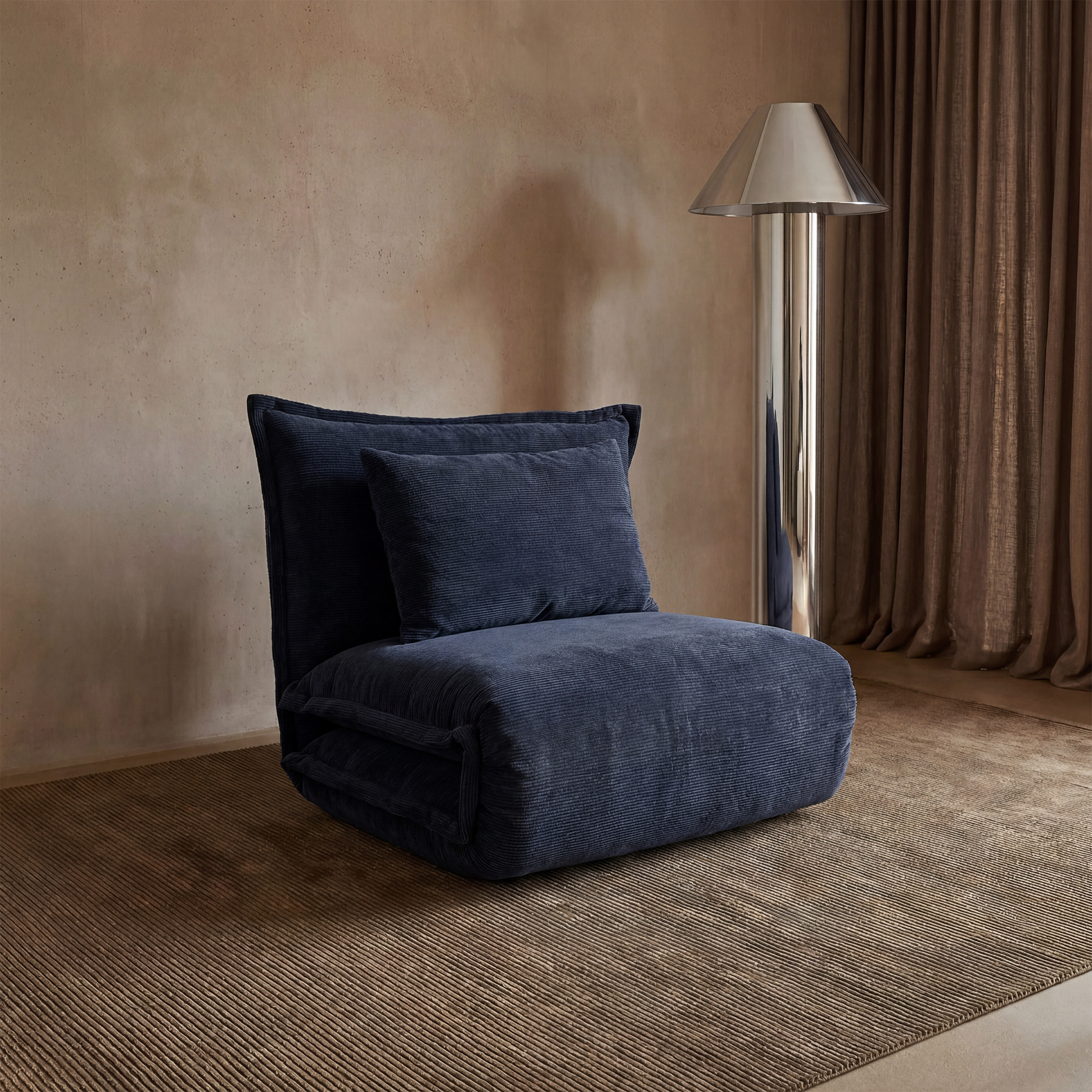 a blue chair with a lamp