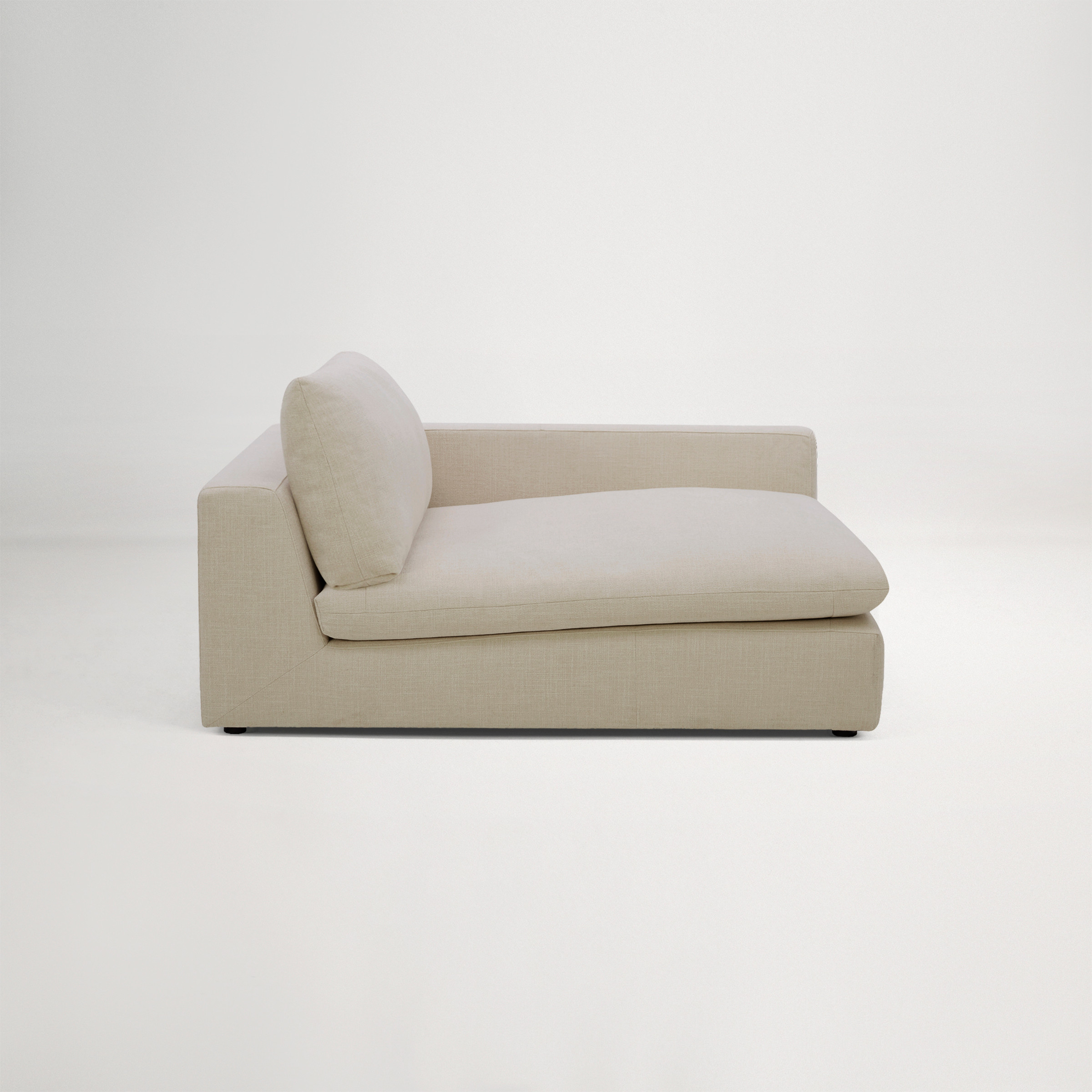 a white chair with a cushion