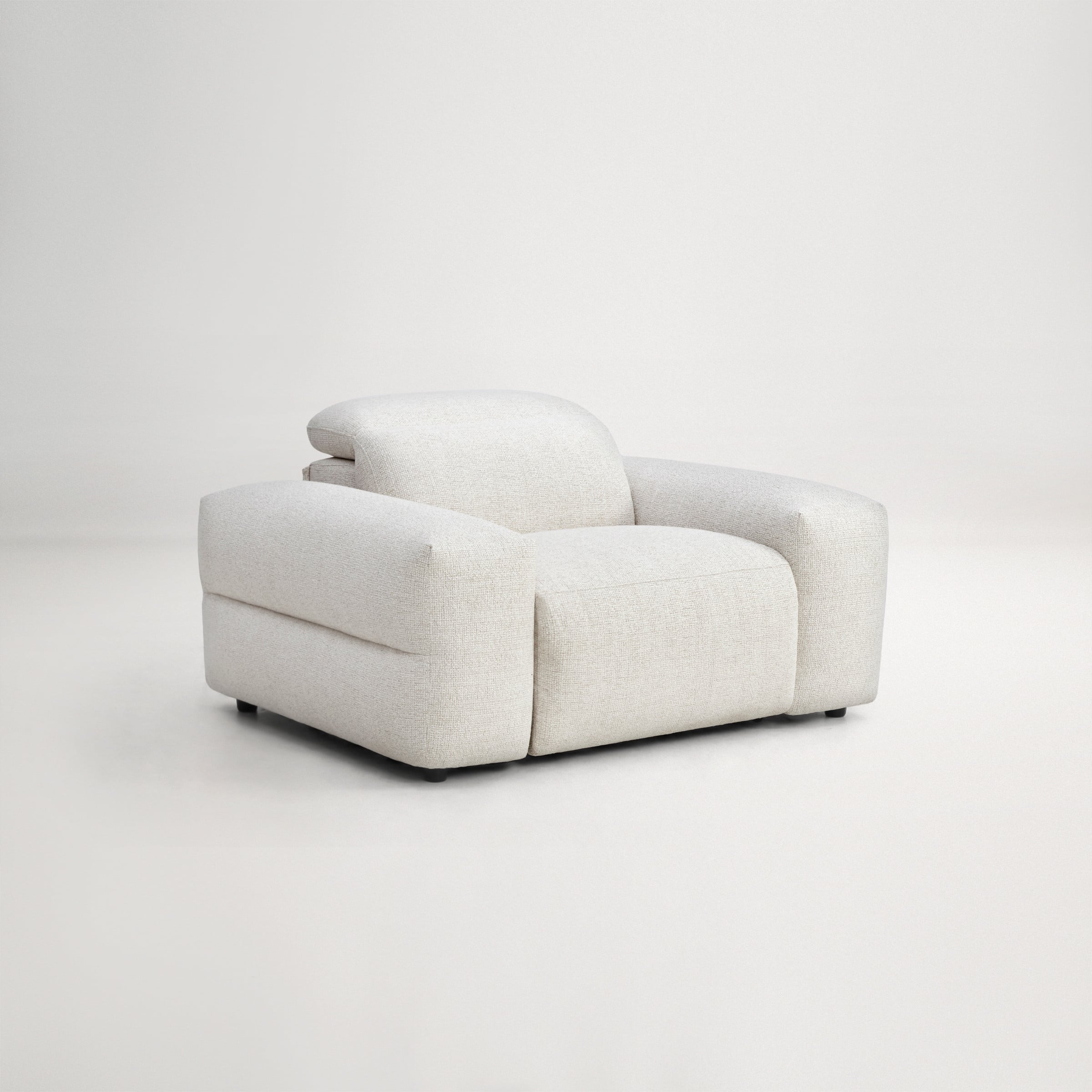 a white couch with a cushion
