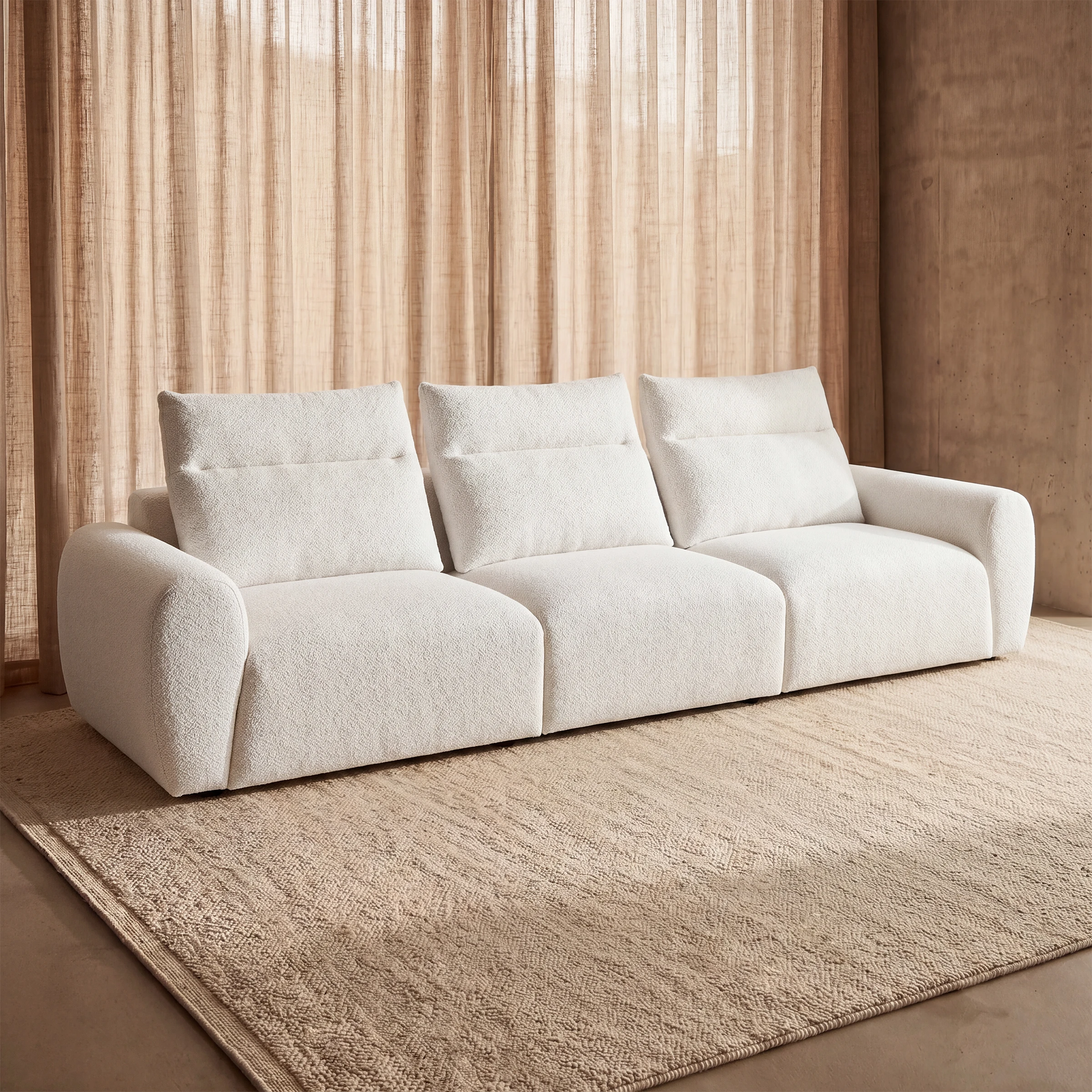 a white couch with a brown wall