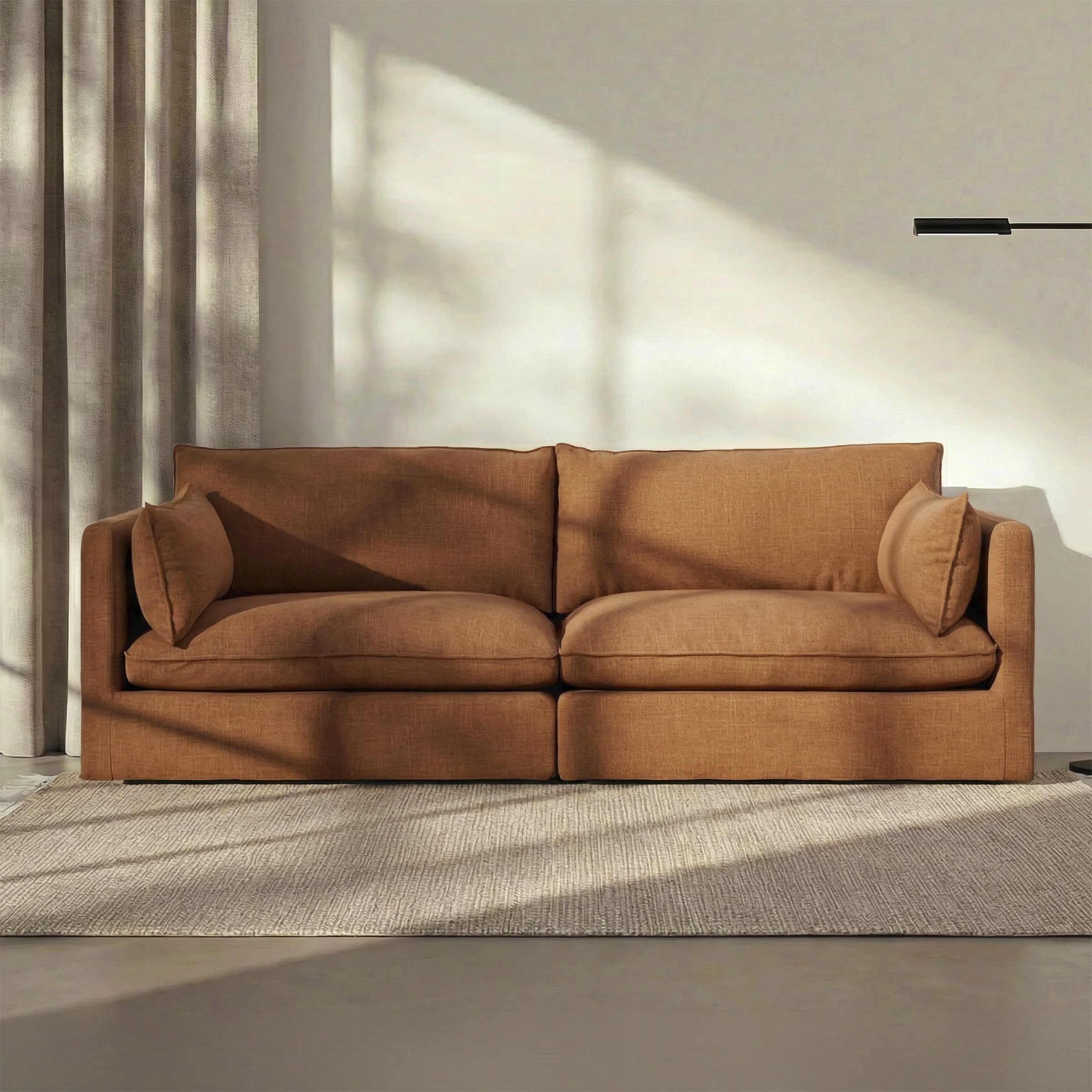 a brown couch in a room