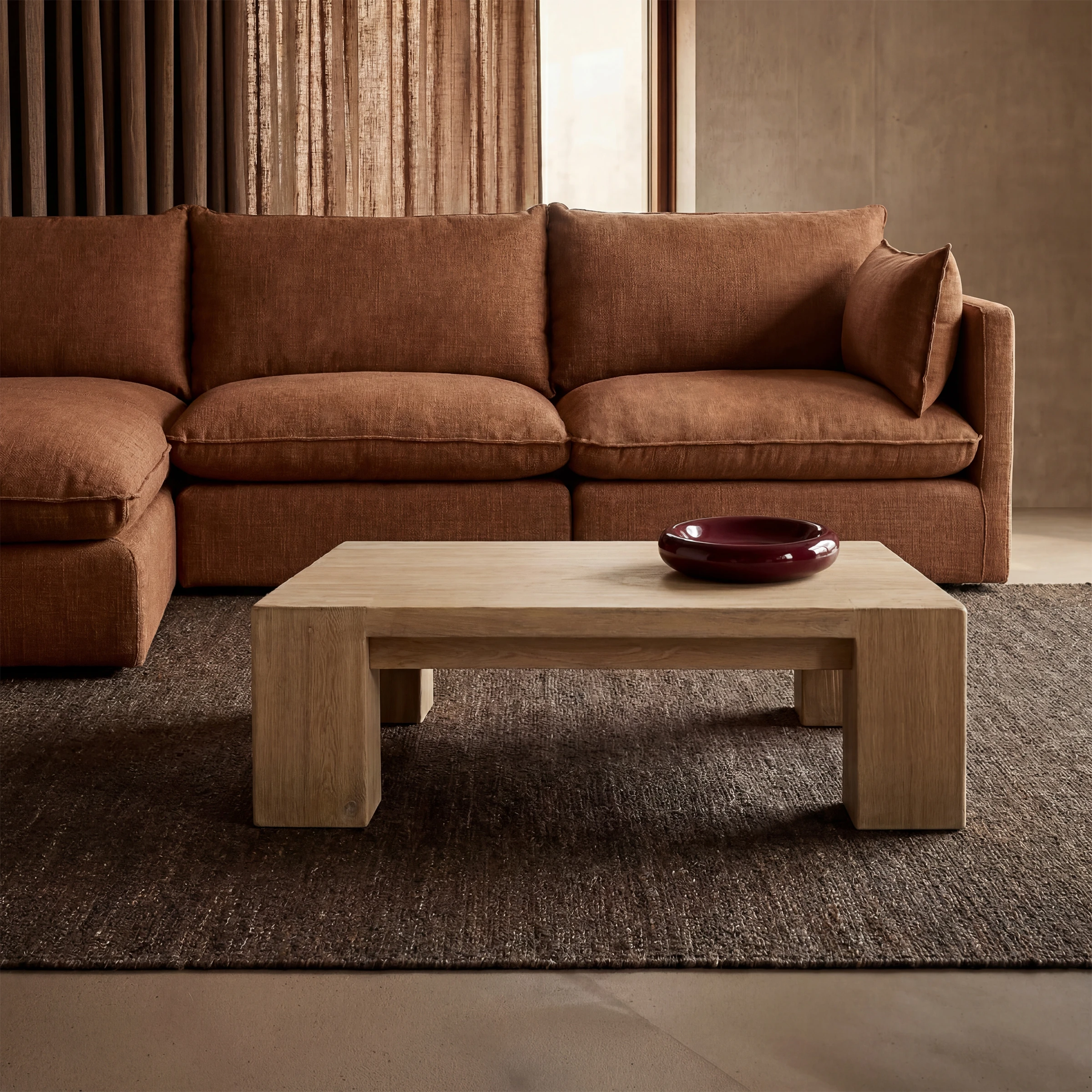 a coffee table with a bowl on it