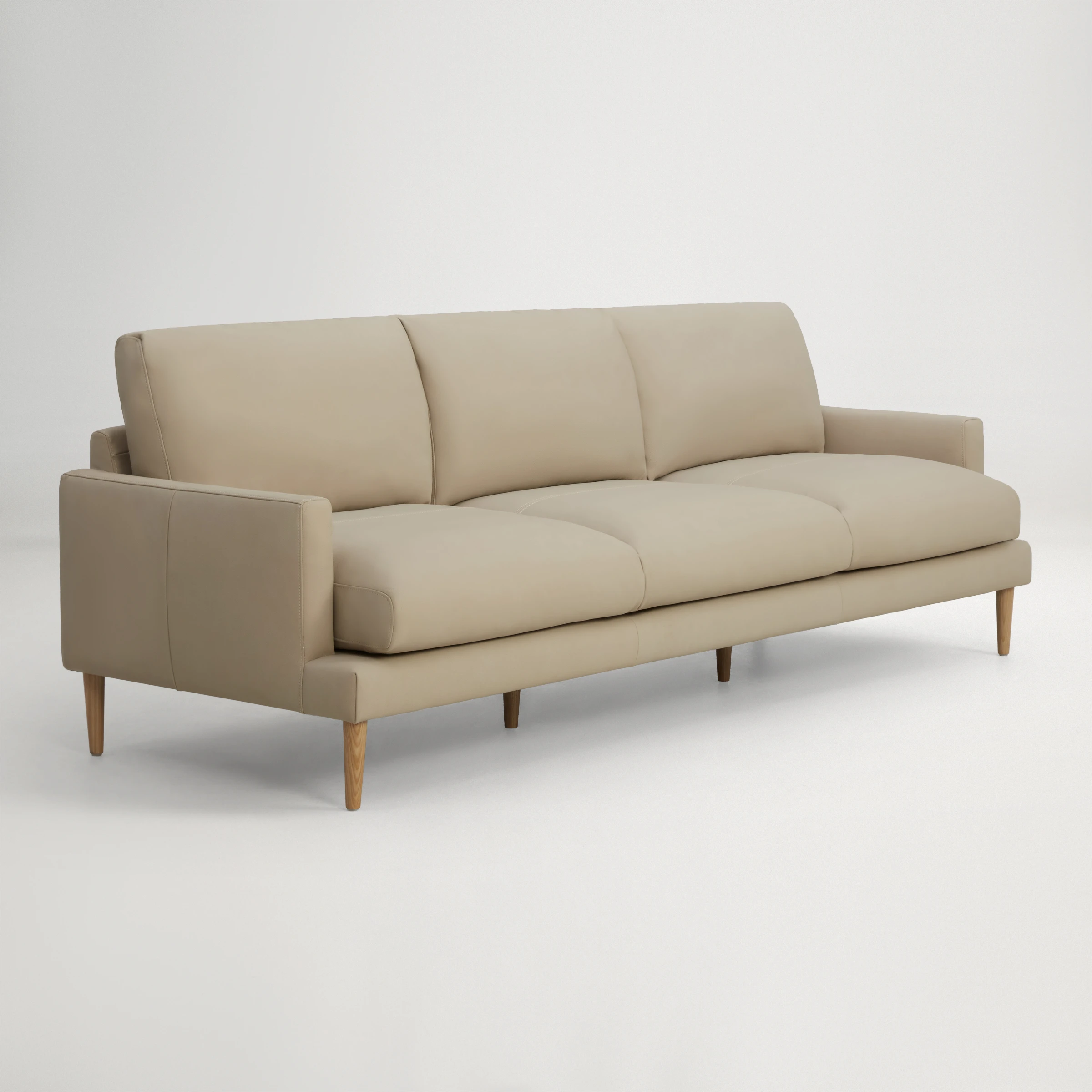a white couch with a white background