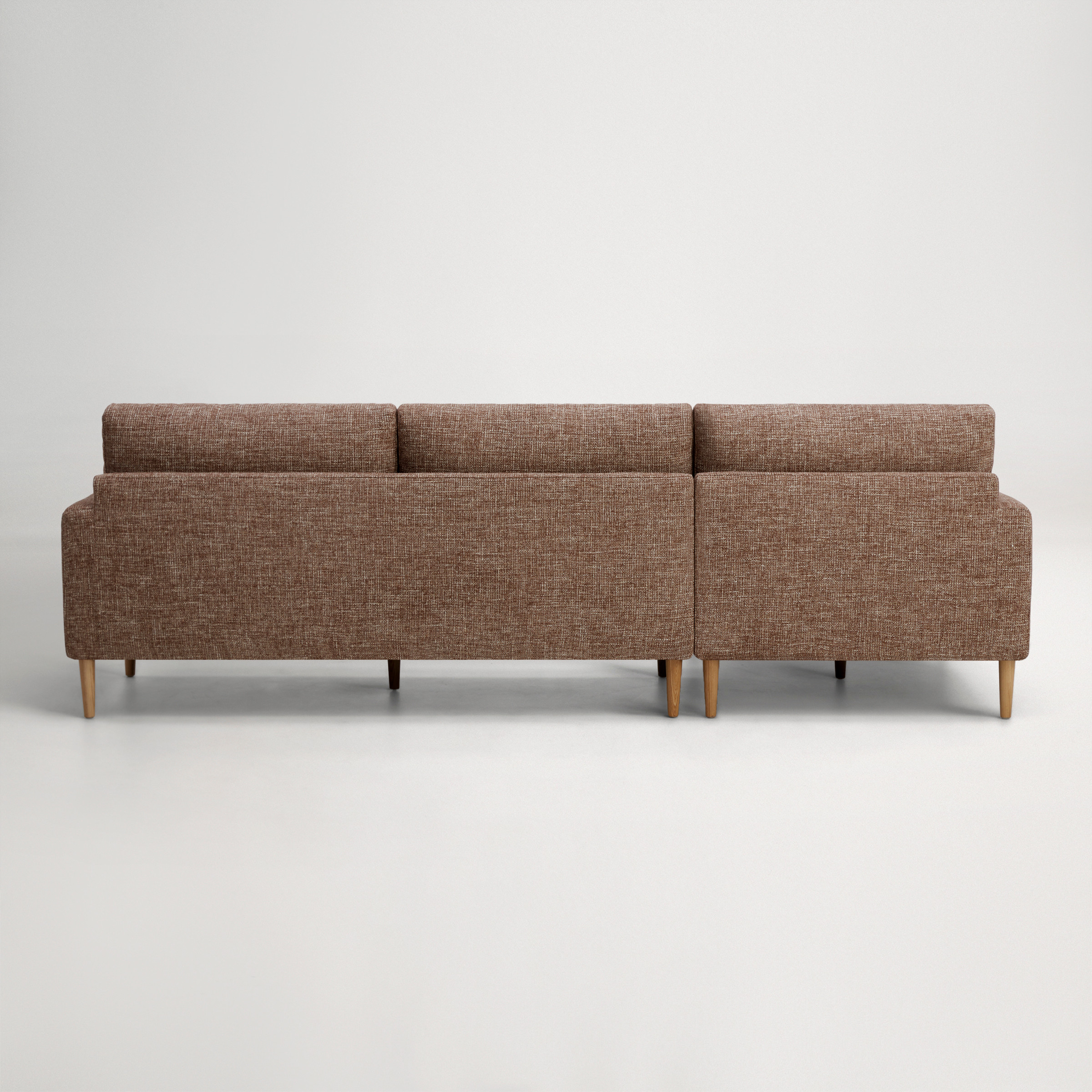 a brown couch with a white background