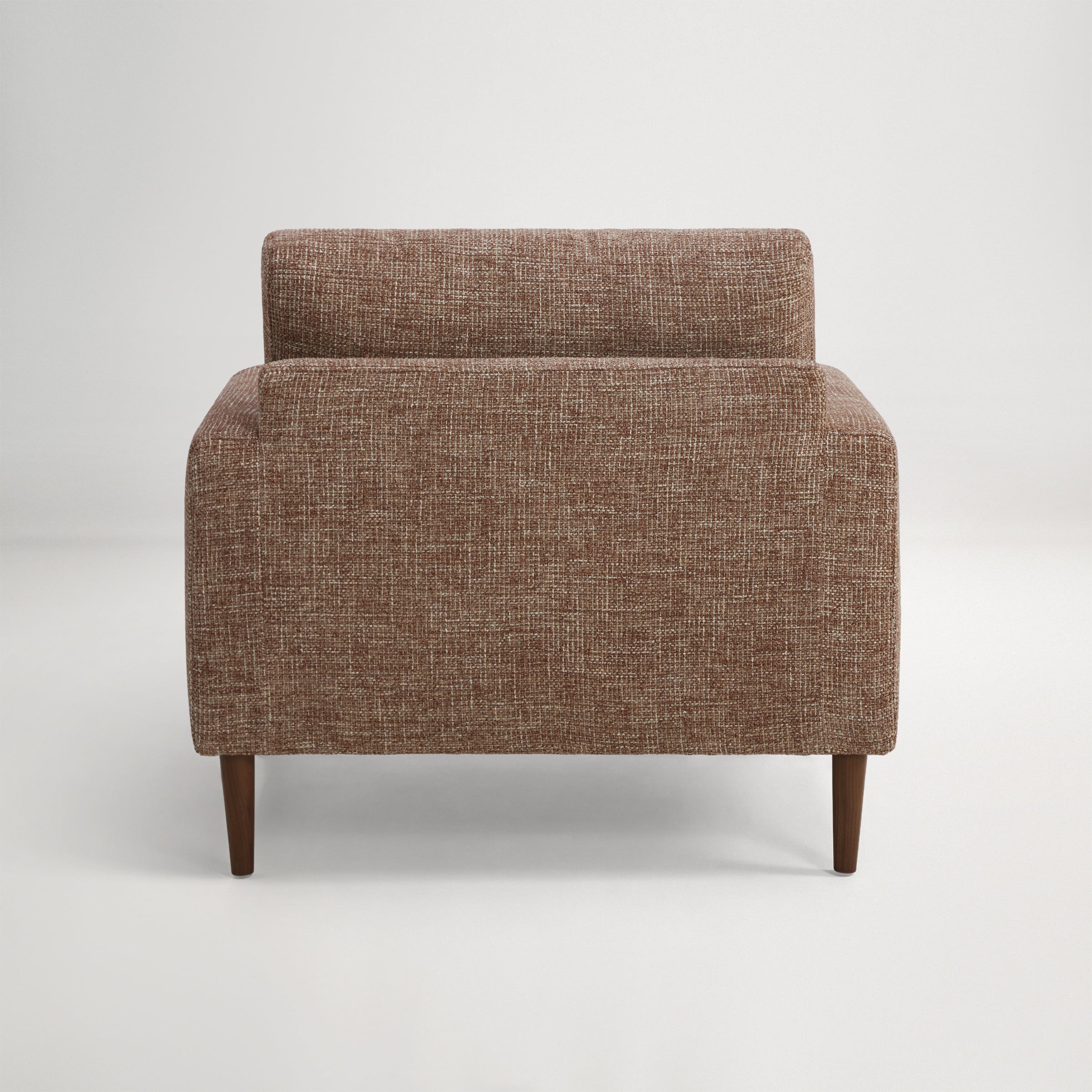a brown chair with a cushion