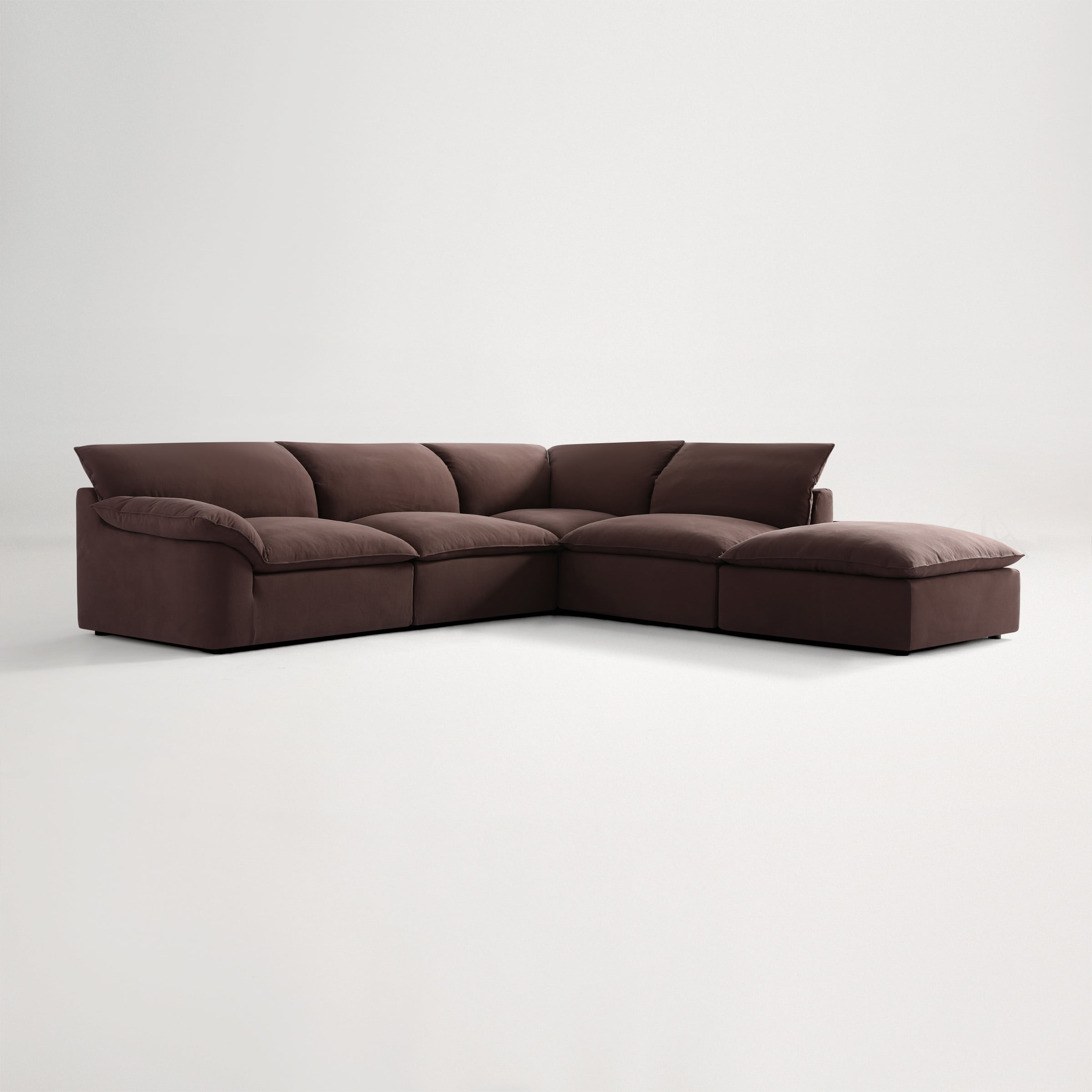 a brown couch with a white background