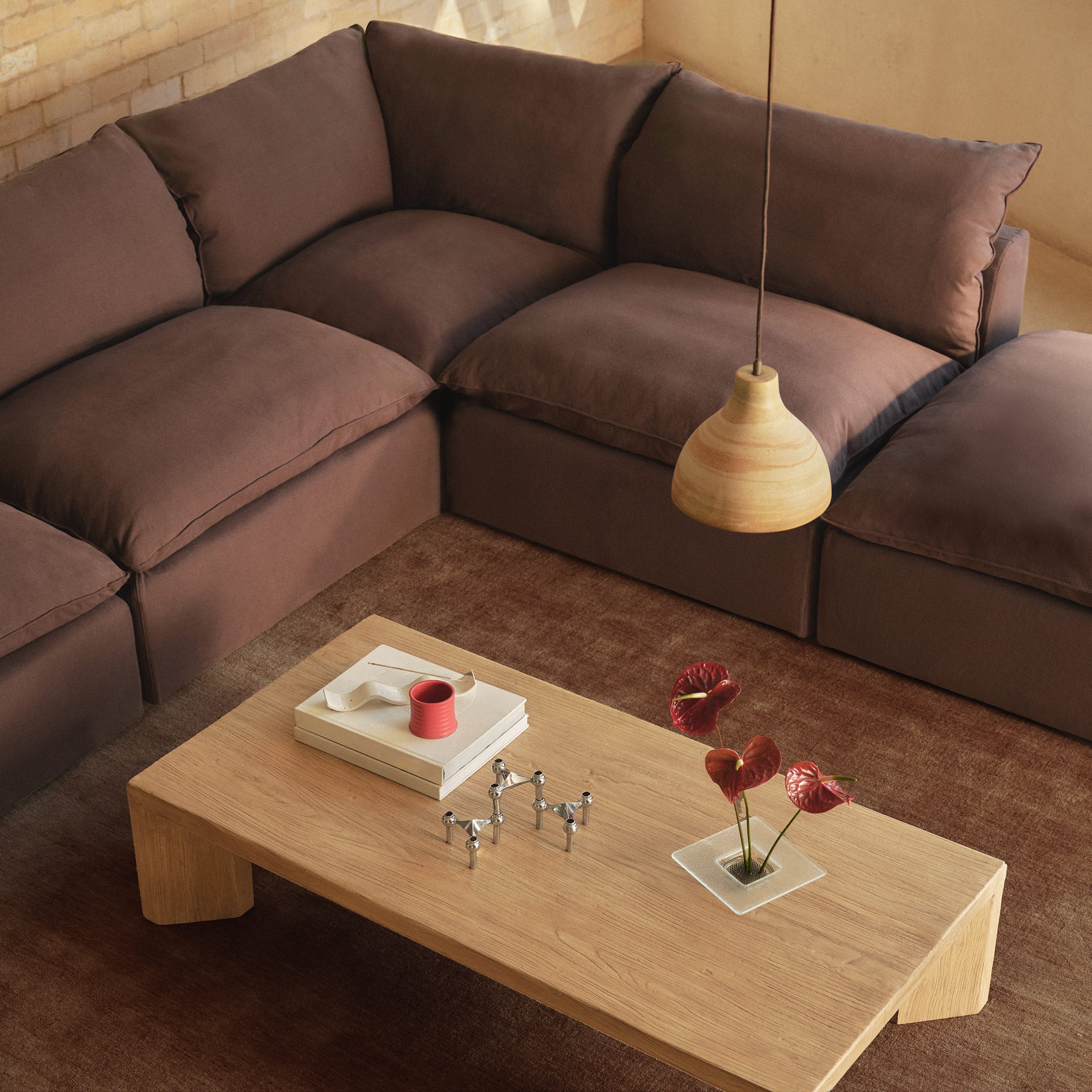 a coffee table with a coffee table and a lamp