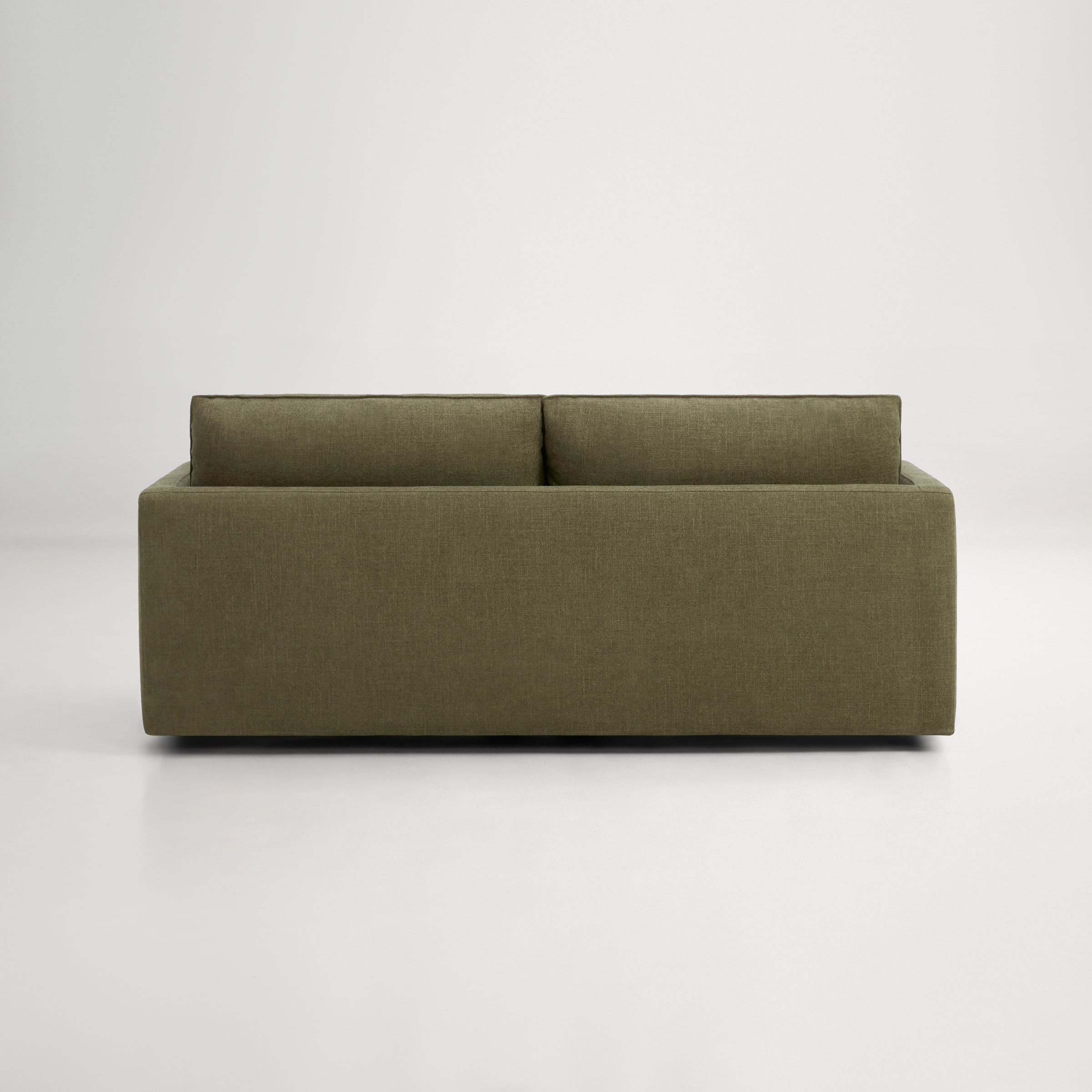 a brown couch with a white background