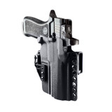 Dara Concealment OWB Holster, a low-profile, black, outside-the-waistband holster for concealed carry with a handgun.