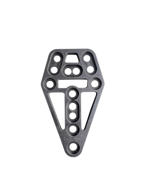 DARA The Bridge modular gear adapter, black, with multiple holes and cutouts for holster attachment.