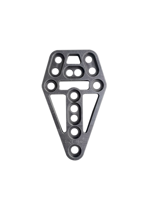 DARA The Bridge modular gear adapter, black, metal, with multiple holes and attachment points visible.