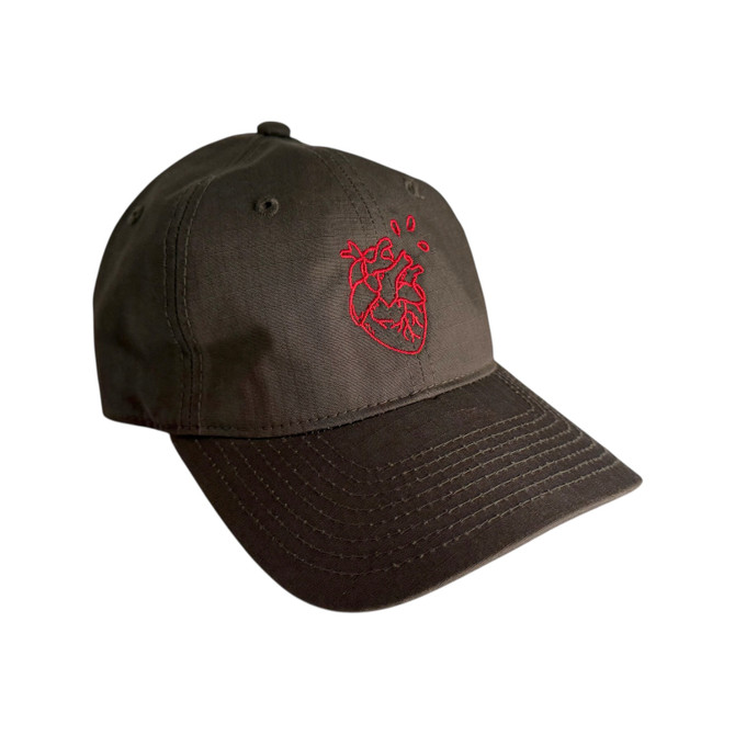 DARA UNSTRUCTURED DAD HAT in dark brown with red embroidered logo on front by DARA brand.