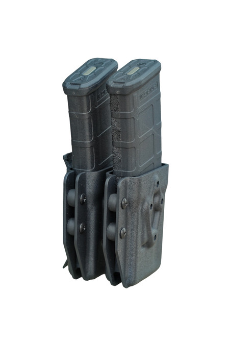Kydex AR Mag Carrier holding two black AR15 magazines with adjustable military grade rubber retention.