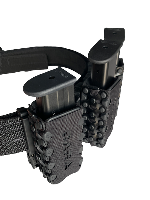 Dara Auto Retention Mag carrier attached to a belt using the Dara Quick Loop attachment. Dara Auto Retention Mag carrier attached to a belt using the Dara Quick Loop attachment.