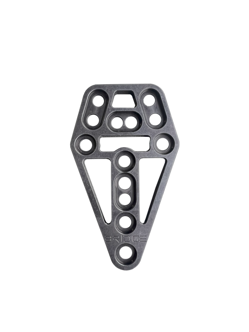DARA The Bridge cross-platform modular gear adapter in black with multiple holes and attachment points.