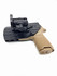DARA mounted vehicle holster with tan kydex grip and black ram mount base for Glock, Sig, HK.
