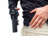 DARA ALQD Receiver Auto Locking Quick Disconnect holster attachment on khaki pants and black shirt.