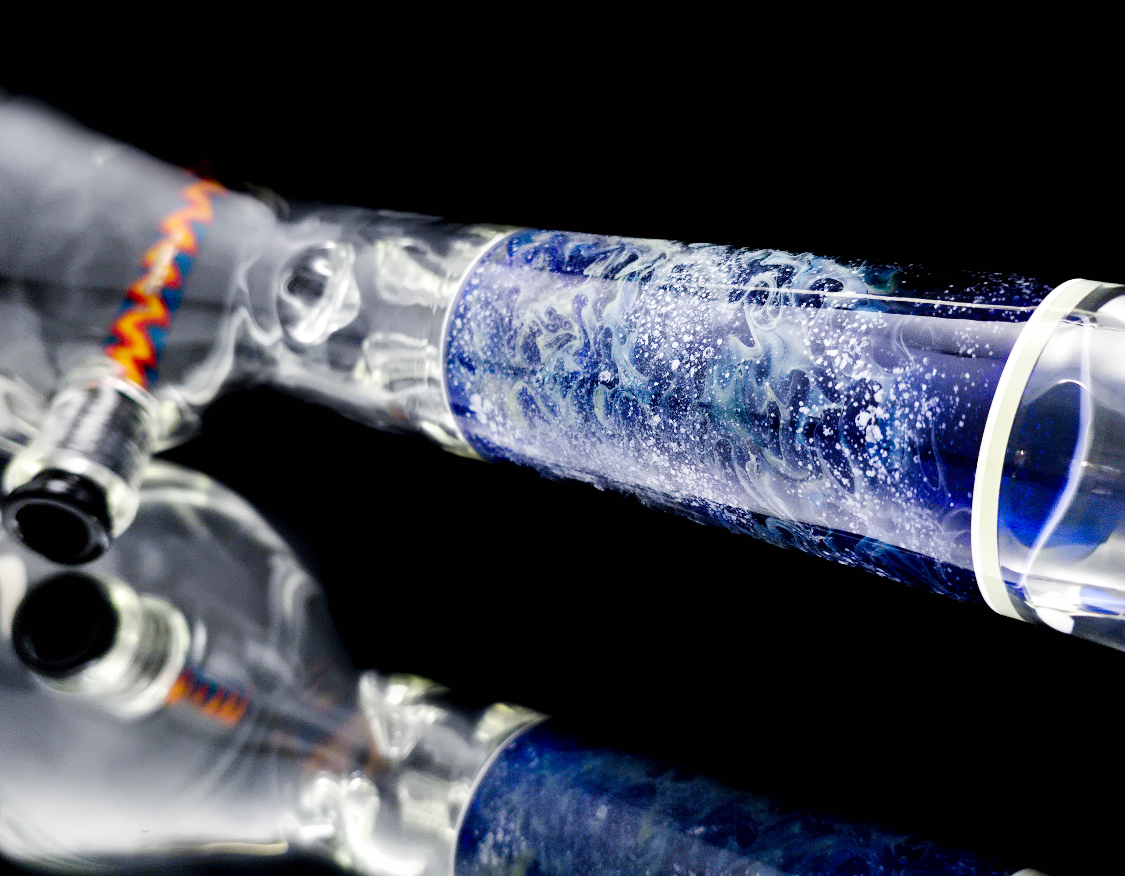 Close-up of the silver-fumed cremation glass section containing ashes