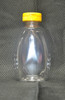 16 oz. (1 pound) clear plastic bottle with flip-top caps