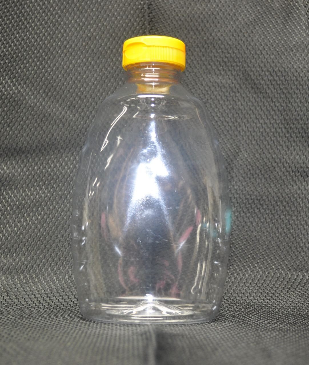 32 oz. (2 pound) clear plastic bottle with flip-top caps