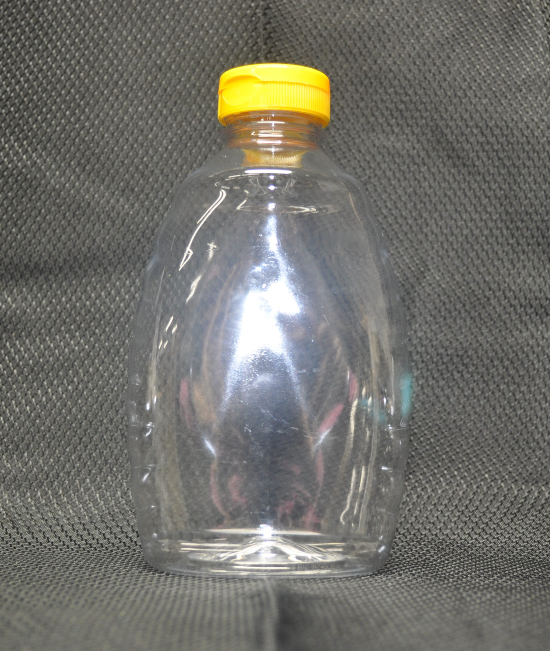 32 oz. (2 pound) clear plastic bottle with flip-top cap