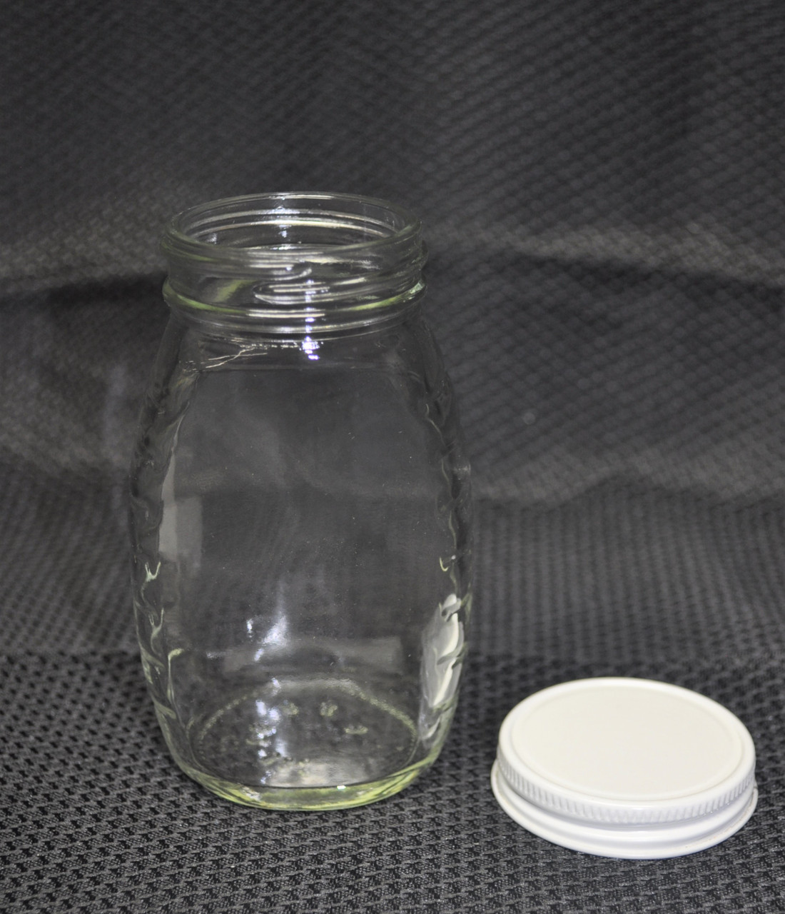 8 oz. glass honey bottle with white metal lid