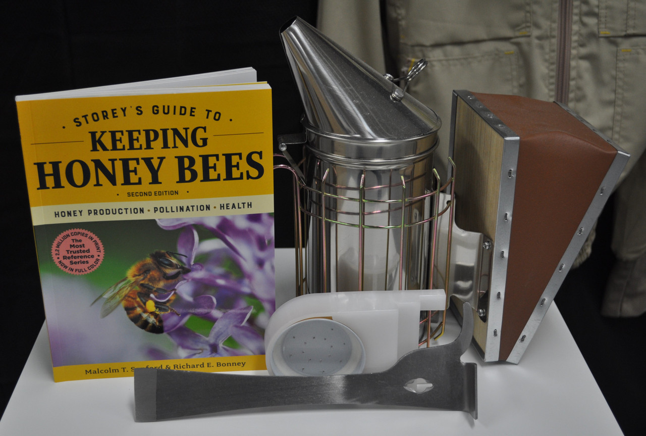 Beginner kit accessories include smoker, j-hook hive tool, Boardman Feeder, Storey's Guide to Keeping Bees book