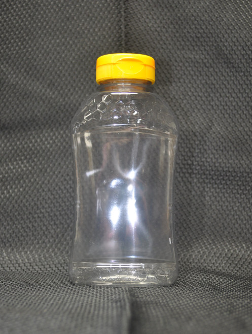 16 oz. (1 lb.) honeycomb pattern, hourglass shaped honey bottle with flip-top cap