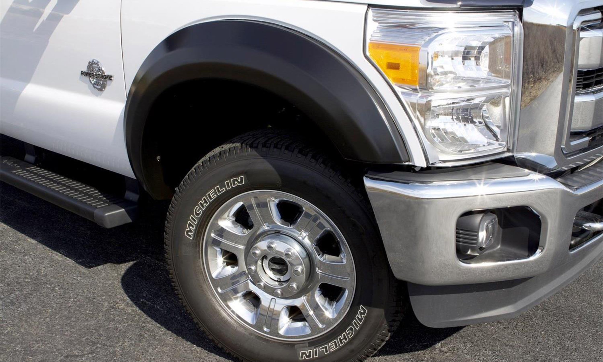 Lund EX314S Elite Series Black Extra Wide Style Smooth Finish 4-Piece Fender Flare Set for 2011-2016 Ford F-250, F-350 (Excludes Dually)-EX314S