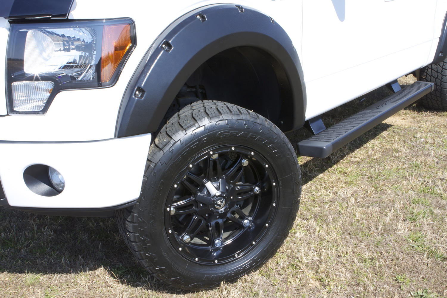 Lund RX312T Elite Series Black Rivet Style Textured Finish 4-Piece Fender Flare Set for 2009-2014 Ford F-150 (Excludes Raptor and Platinum)-RX312T
