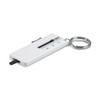 A white tyre tread key ring with a measurement ruler and a silver metal keyring attached.
