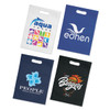 Four tote bags in various colours feature different logos and designs, including a blue, navy, and white bag.