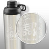 A drink bottle in metallic silver with a black lid and a handle, featuring a printed logo.