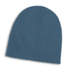 A blue cable knit beanie featuring ribbed texture and a simple design. It has a logo on the side.