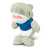 A green shark plush toy wearing a blue shirt, featuring soft fabric and a friendly expression.