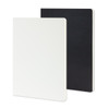 A large Moleskine Volant journal in white and black with smooth covers and rounded corners.