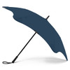 A navy blue BLUNT Coupe Umbrella with a sturdy black handle and a curved canopy design. It features a logo.