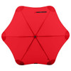 A red umbrella with a unique star shape, featuring a central button and a handle, also displaying a logo.