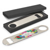A drink bottle opener in silver, featuring a colourful design, placed inside a black gift box.
