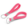 A pink silicone key ring with a smooth finish and a metal ring for attachment.