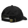A black oilskin cap featuring a brass buckle adjustment on the back and a textured fabric finish.