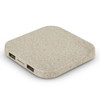 A square wireless charger with a speckled beige surface and two ports on the side, featuring a logo.
